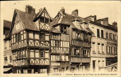 Casa de la mujer mayor de Lisieux de la POSTAL de la VENDIMIA del lugar del mercado a la mantequilla