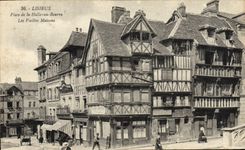 Mercado de los lugares de Lisieux de la POSTAL de la VENDIMIA en la mantequilla las casas viejas
