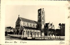 VINTAGE POSTCARD Lion on sea the church