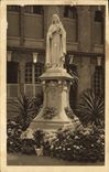 CPA Statue de Sainte Therese de l'Enfant Jesus dans la cour d'entree du Carmel de Lisieux