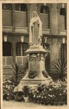 CPA Statue de Sainte Therese de l'Enfant Jesus dans la cour d'entree du Carmel de Lisieux
