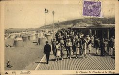 VINTAGE POSTCARD Deauville the bemin of llanches and the beach