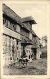 VINTAGE POSTCARD Lisieux and its Surroundings Old woman close Norman has Saint Jacques de Lisieux Vache