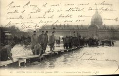VINTAGE POSTCARD Floods Of Paris Construction of a Footbridge Invalids Genius