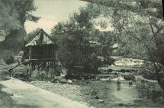VINTAGE POSTCARD House at the edge of a river