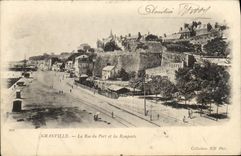 CPA Granville La Rue Du Port Et Les Remparts