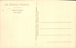 CPA La Douce France Nimes Les Arenes