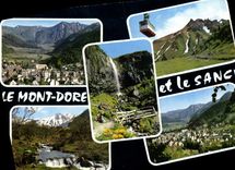 CPM L'auvergne Touristique Le Mont Doreiait Vues Generales La Grande Cascade Et Le Puy De Sancy