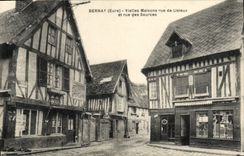 VINTAGE POSTCARD Bernay Hurdy-gurdies Houses street De Lisieux and street of the sources