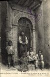 VINTAGE POSTCARD Scenes And Standard Arab Children At the Gate Of the House Children
