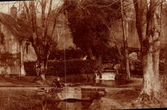 Real photo House at the edge of water