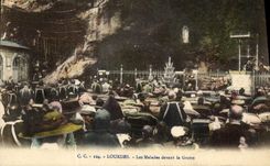 VINTAGE POSTCARD Heavy Patients In front of the Cave