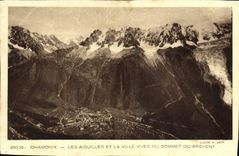 Agujas de Chamonix de la POSTAL de la VENDIMIA y la ciudad vista de la cumbre de Brevent