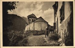 CPA Les Pyrenees Saligos La Vieille Eglise Femme Cheval