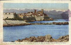 VINTAGE POSTCARD Antibes Walls of the sea front the Holy bastion Andre and the Alps