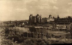 VINTAGE POSTCARD the Abbey De Solesmes Seen of the slopes in the west