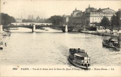 VINTAGE POSTCARD Paris Seen Of the Seine Towards Train station Of the Quay of Orsay Notre Dame Boat barge