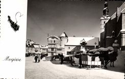 MODERN CARD Megeve the place of the church and sledges