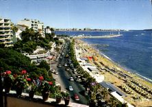 CPM La Cote D'Azur Cannes Le boulevard Jean Hibert et la plage du Midi La pointe du Palm Beach 