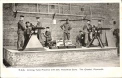 VINTAGE POSTCARD Bateau RGA Aiming tubes Practice with 6lb Hotchkiss Guns The citadel Plymouth