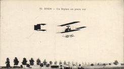 VINTAGE POSTCARD Plane Bron Aviation a biplane in full flight