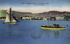 VINTAGE POSTCARD Cannes Seen On the Beach Boats