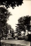 CPM Laigle L'entree Du Parc Et Le Monument Aux Morts