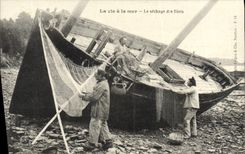 Vida de la POSTAL de la VENDIMIA con el mar la sequedad del barco de las redes