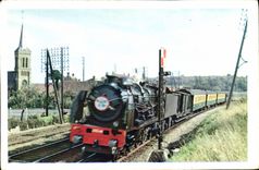 CPm Train the fast gold arrow Paris Calais maritime