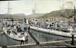 VINTAGE POSTCARD Toulon Boat Against destroyers with the small row