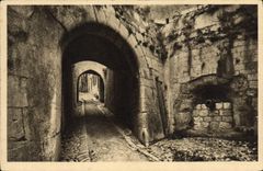 VINTAGE POSTCARD Saint Paul the entry of the village by the old fortifications and the gun which defended it