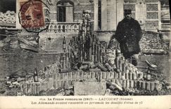 VINTAGE POSTCARD Militaria Laucourt German had gathers in pyramid the casings of shell of 75