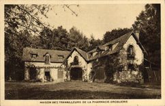 VINTAGE POSTCARD House of the workers of pharmacy hardware store