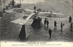 VINTAGE POSTCARD Militaria Exposition with the hotel of the invalids has Paris Airplane Taube taken with the enemy
