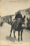 CPA Folklore Pyrenees Femme se rendant au marche Ane mule 