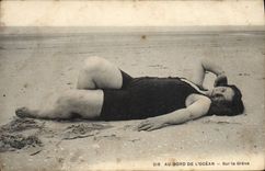 VINTAGE POSTCARD Woman Bathing suit At the edge of the ocean On the strike