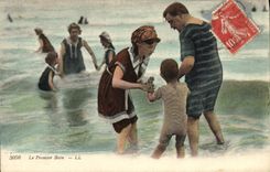 VINTAGE POSTCARD Woman Bathing suit the first Bath Child