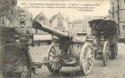 CPA Militaria Furnes Le nouveau canon de 120 long avec tracteur automobile traversant la grand place 