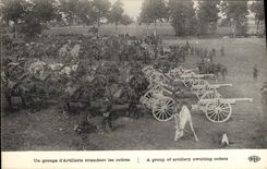 VINTAGE POSTCARD Militaria a group of artillery awaiting their order