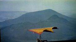 MODERN CARD Auvergne Hang glider with the top of the chain of the Domes