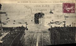 VINTAGE POSTCARD Bateau St Nazaire a launching with the building sites of the Loire armours It France has leaves the hold