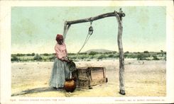 VINTAGE POSTCARD Indian Papago indian filling the Olla