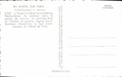 CPM En Avion Sur Paris L'Ile de la Cite et la Cathedrale Palais du Louvre Le Pont des Arts et l'Institut 