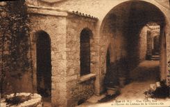 POSTAL Eze de la VENDIMIA una calle vieja y la entrada del castillo de la cabra del oro