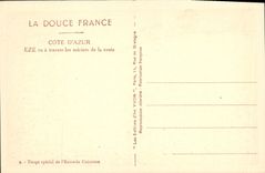 POSTAL Eze de la VENDIMIA visto a través de los árboles de mora del camino