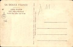 Calle Taillee de la mujer mayor de Eze de la POSTAL de la VENDIMIA en el café de la roca