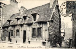VINTAGE POSTCARD Lisieux Old woman House Norman Street D' Orbec