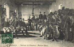 VINTAGE POSTCARD Militaria 22nd of infantry Interior of room Music (wood) Violoncello Clarinet
