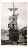 VINTAGE POSTCARD Marseilles Boat a sailing ship in the viex port In the distance Canebiere