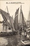 VINTAGE POSTCARD Boat of sin Sables d'Olonne Arrived of the sardinieres in front of the fish shop